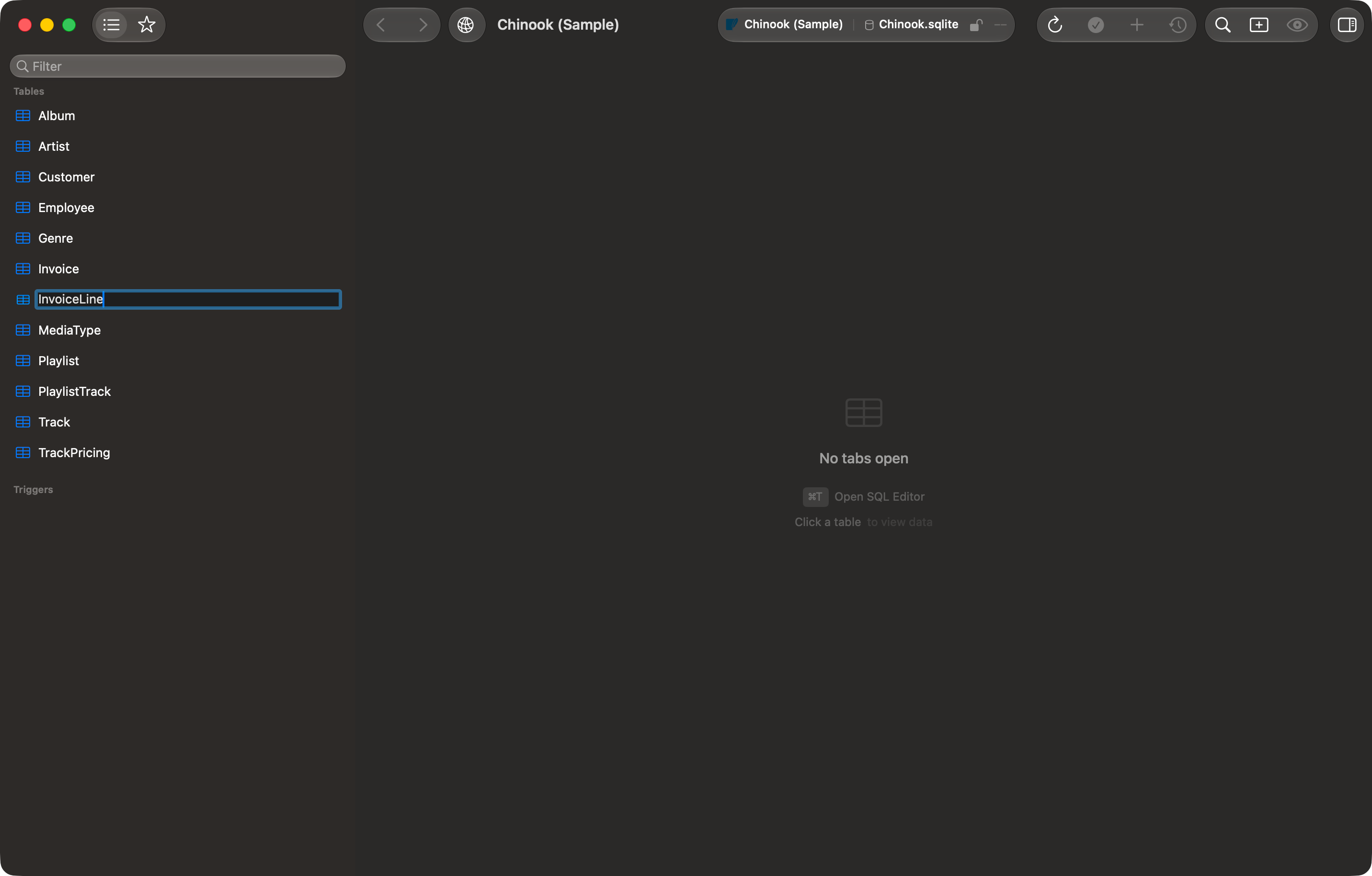 TablePro sidebar object tree with a table row in edit mode, its name selected in an inline text field ready to be typed over, the surrounding tables and the schema container row unchanged around it, and the right-click menu that opened it still showing Rename above Truncate and Drop