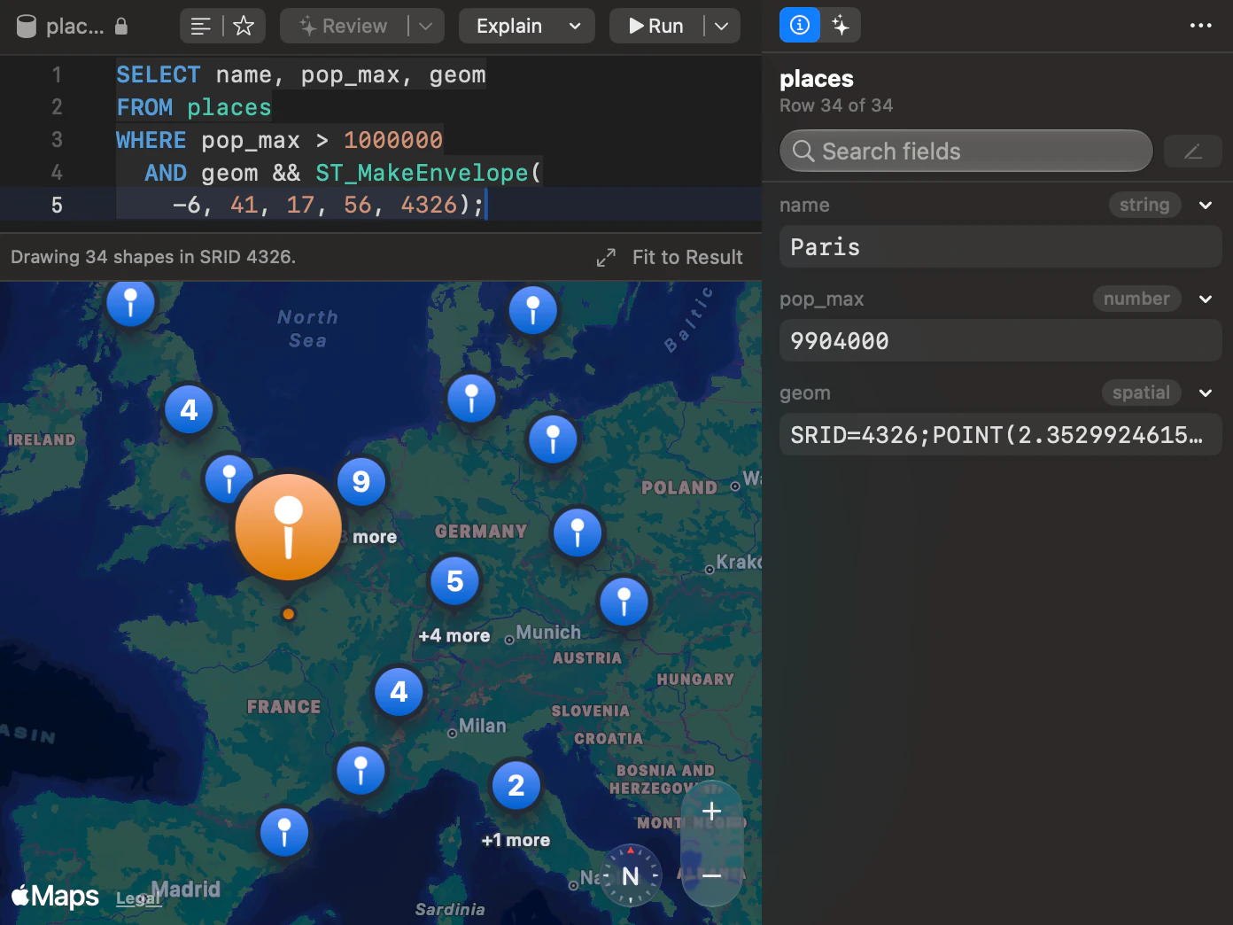 The Map view plotting populated places from a PostGIS table, with the selected point, Paris, in the row inspector.